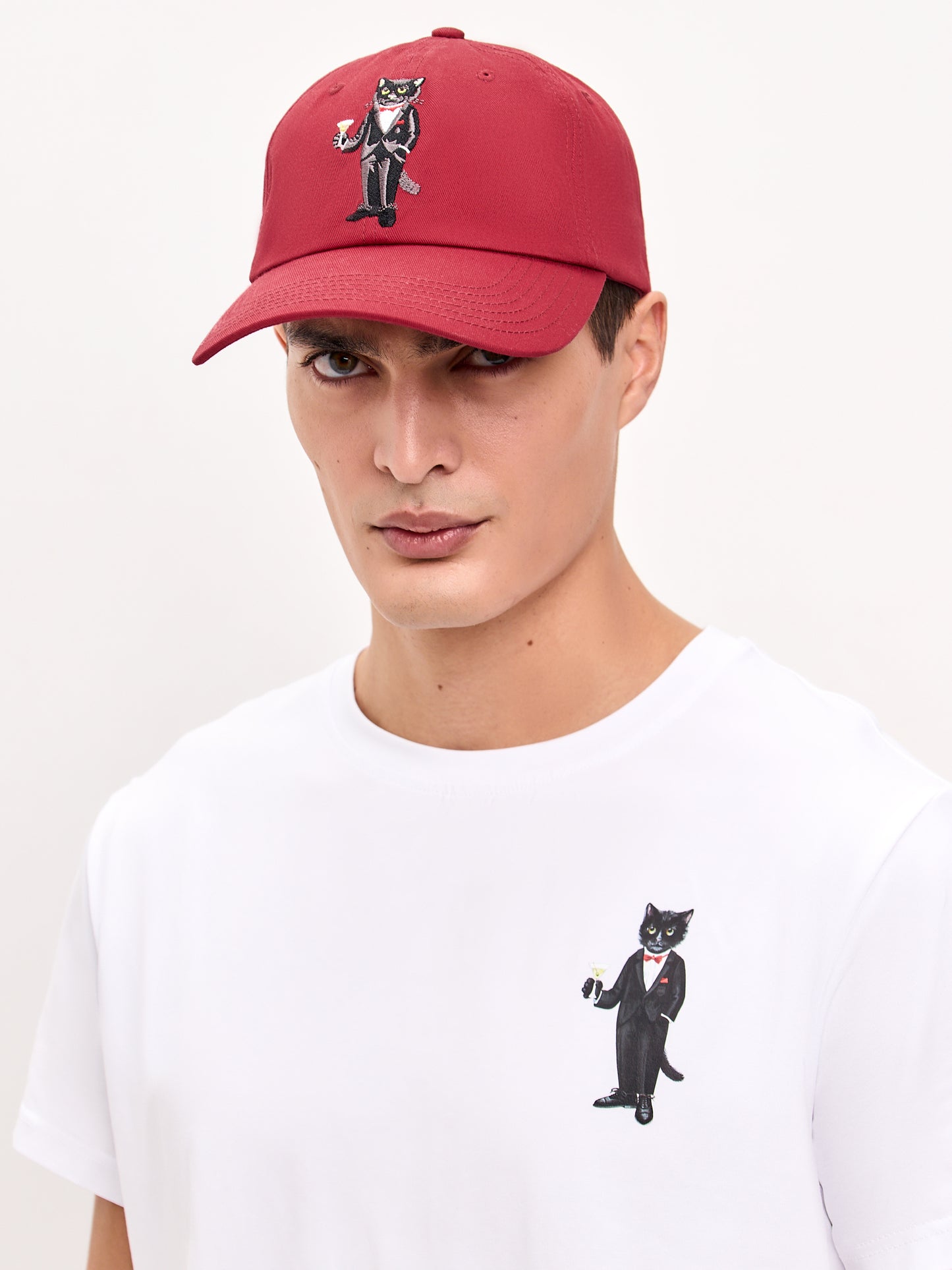 Set: men's white T-shirt with a mini print of a DANDY CAT and a dark red cap with Cat embroidery