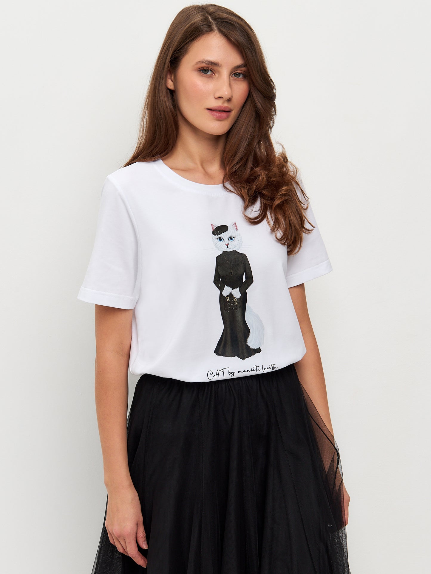 Set: women's white T-shirt with a white cat and black mesh skirt