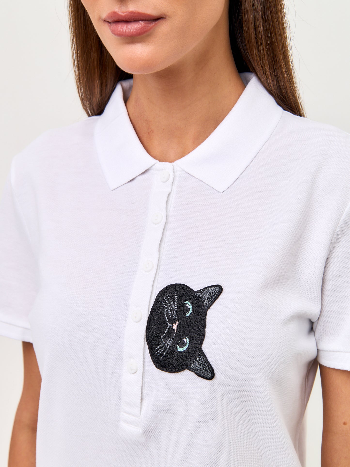 Set: women's white polo shirt with a black cat and black wide-leg sweatpants