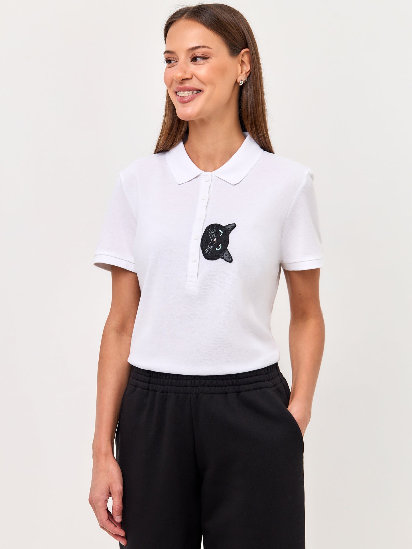 Set: women's white polo shirt with a black cat and black wide-leg sweatpants